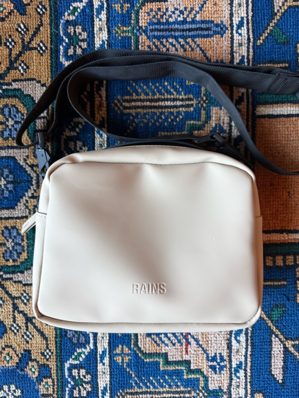Rains Cream Crossbody with Black Strap